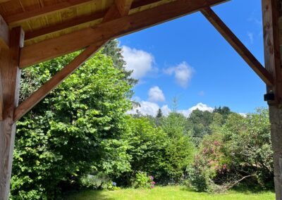 Terrasse couverte côté étang